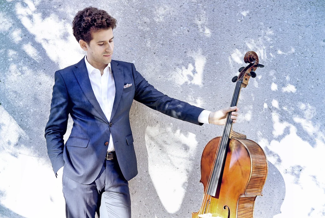 photo of nicholas canellakis, looking at his cello