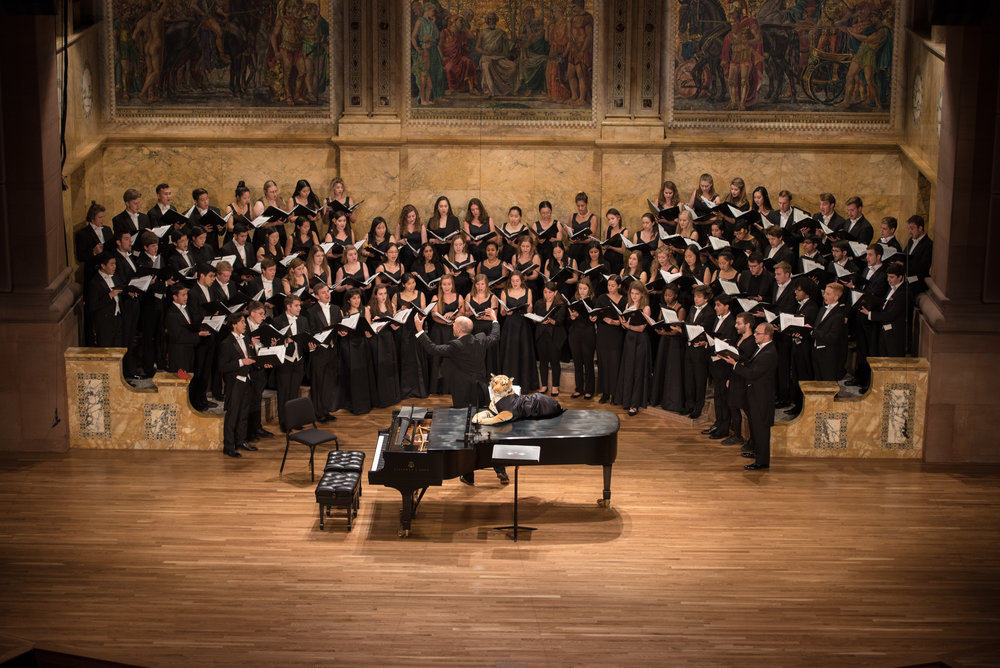 Photo of Yale and Princeton Glee Clubs singing on stage