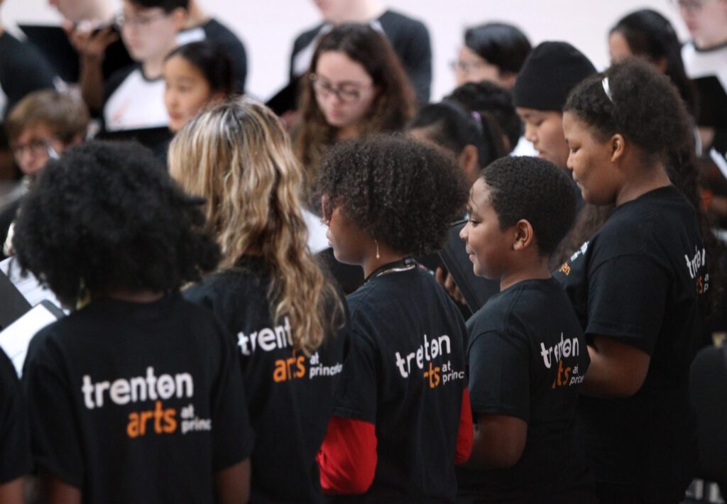TAP students wearing a TAP t-shirt.